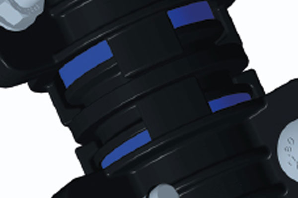 Close-up of blue rubber sealing gaskets fitted inside a black plastic pipe coupling assembly