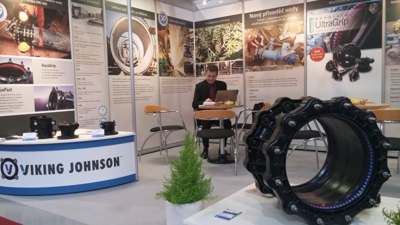 Viking Johnson exhibition stand displaying industrial pipe couplings and promotional posters