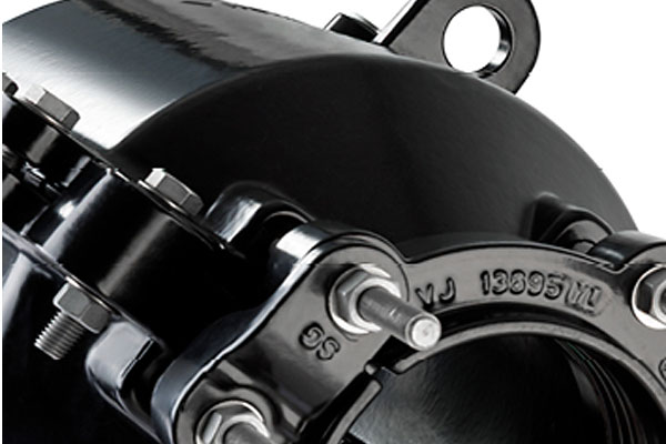 Black heavy-duty pipe coupling with bolted flange, lifting eye, and embossed markings