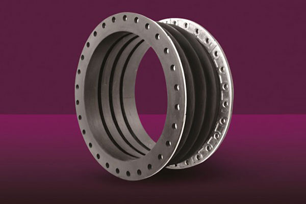 Flexible rubber expansion joint with metal flanged ends and bolt holes