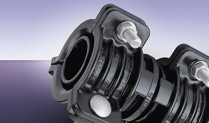 Heavy-duty black pipe coupling clamp secured with threaded bolts and nuts